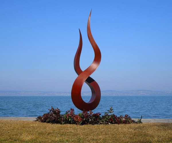 Huge flame sculpture garden rusty iron